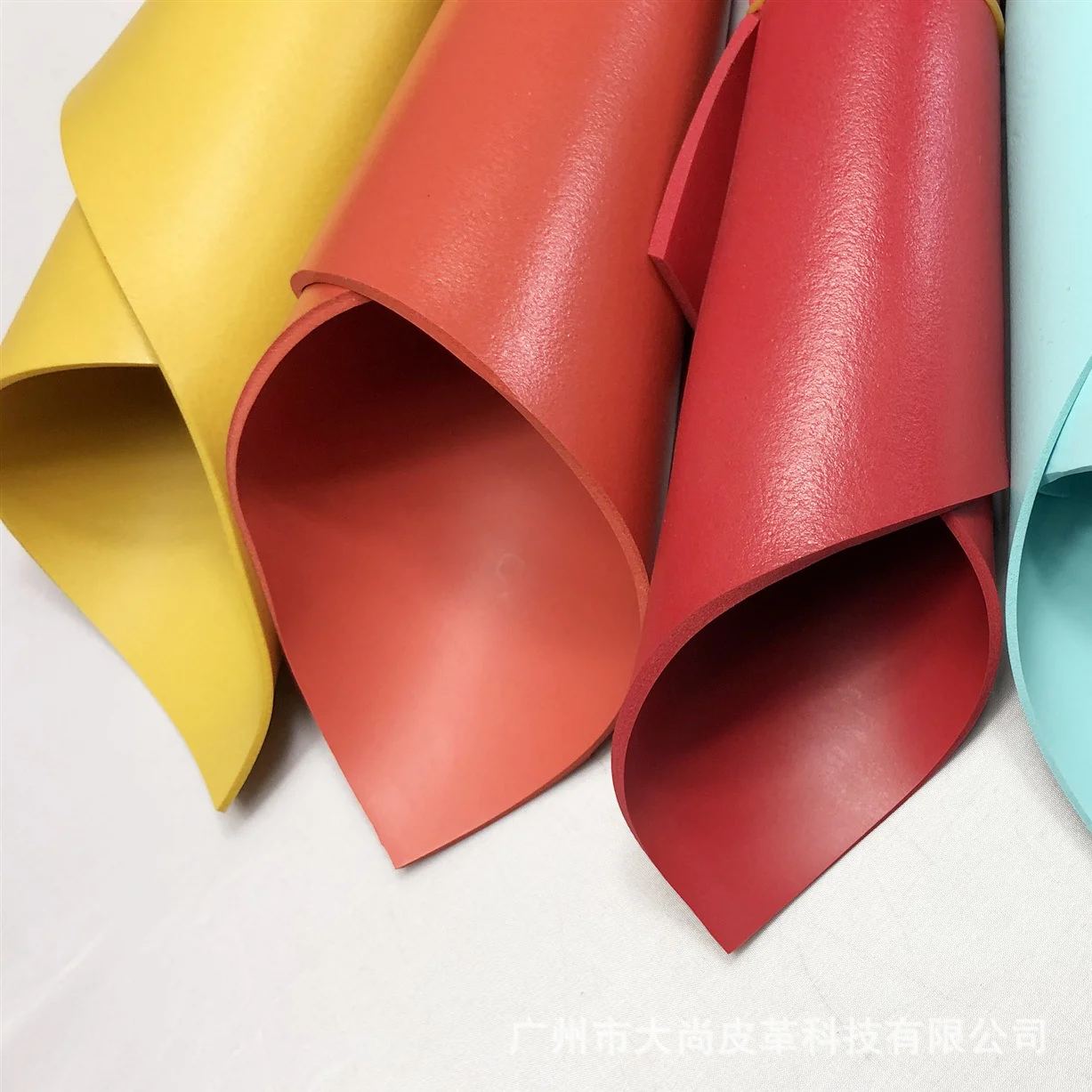 Elastic back-coated TPU vacuum forming without fabric leather