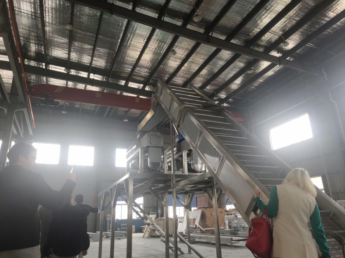 解析水果罐头生产线链板输送机的驱动方式设计