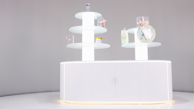 广州化妆品旋转展台定制