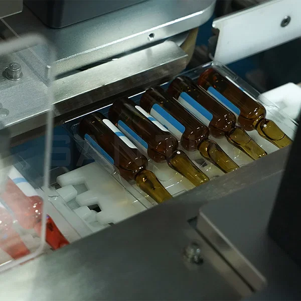 Integrated Labeling and Bottle-to-Tray Inserting Machine