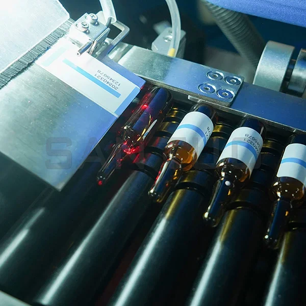 Integrated Labeling and Bottle-to-Tray Inserting Machine