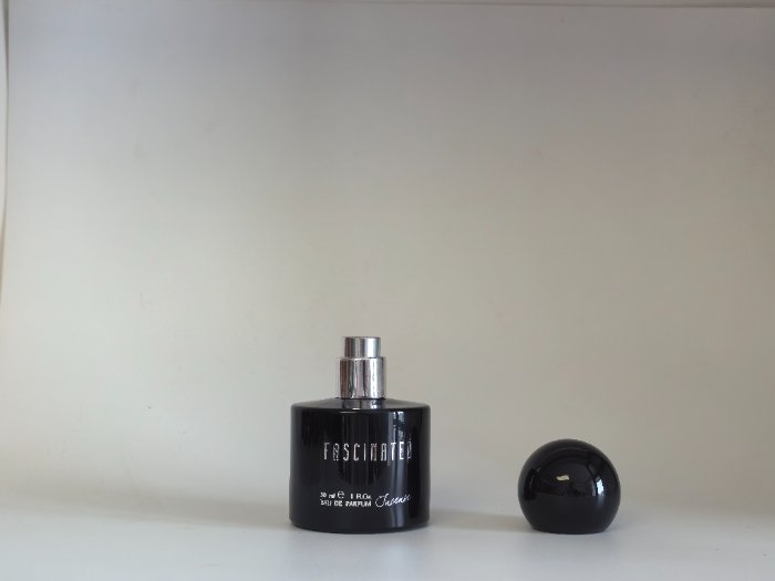 Black perfume bottles and caps