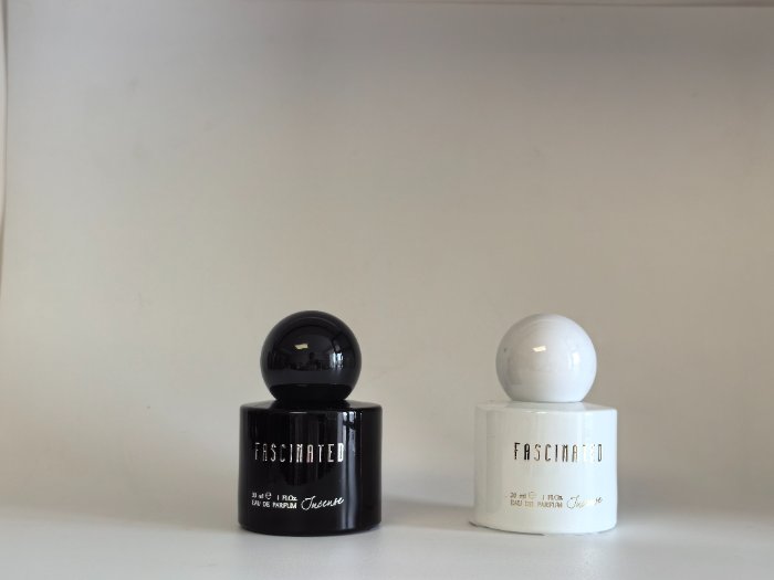 Black perfume bottles and caps