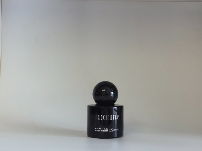 Black perfume bottles and caps